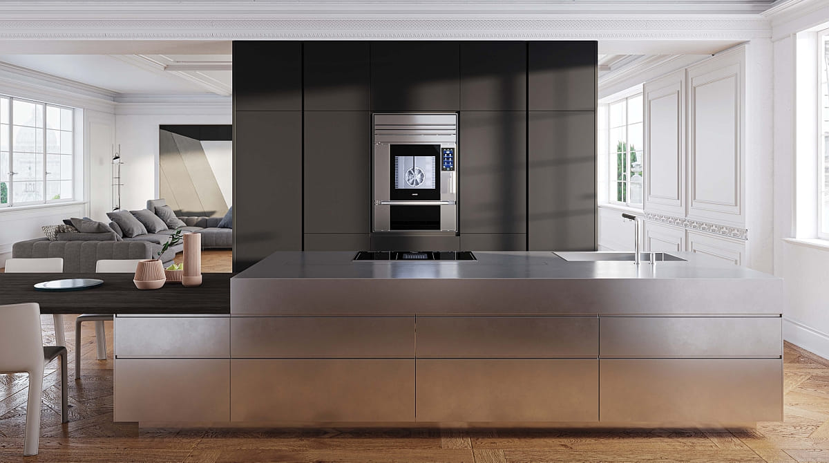 Une cuisine moderne avec des surfaces métalliques